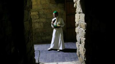 A Musaharati (dawn awakener) strikes his drum to wake observant Muslims for their overnight 'sahur', before the day's fast during Ramadan in Sidon's Old City in south Lebanon. Ali Hashisho / Reuters
