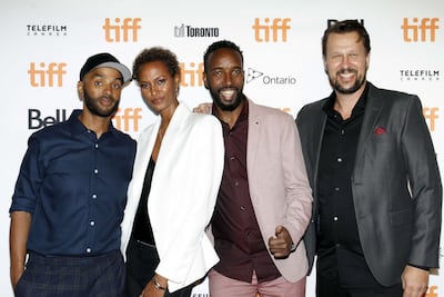 From left to right: Khadar Ayderus Ahmed, Yasmin Warsame, Omar Abdi, and Risto Nikkila attend 'The Gravedigger's Wife' photocall during the 2021 Toronto International Film Festival. Getty Images / AFP