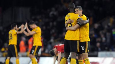 Wolves' Conor Coady and Willy Boly celebrate at the end of the match. AP Photo