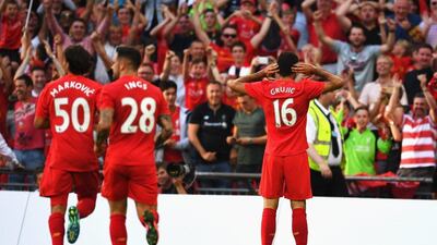 Marko Grujic celebrates scoring Liverpool’s fourth goal. Mike Hewitt / Getty Images
