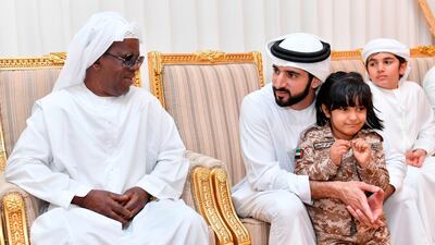Sheikh Hamdan visits the mourning majlis in Al Huwailat to pay his respects to the Al Mesmari family. Wam