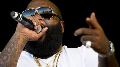 FILE - This July 7, 2012 file photo shows rapper Rick Ross performing during the OpenAir music festival in Frauenfeld, Switzerland. Reebok has ended its relationship with Rick Ross following the heavy criticism surrounding the rapper's lyrics some have called pro-rape. The sneaker brand said in a statement Thursday, April 11, 2013, that “Reebok holds our partners to a high standard and we expect them to live up to the values of our brand. Unfortunately, Rick Ross has failed to do so.” Rick Ross formally apologized for his lyrics on Rocko's song "U.O.E.N.O.” in a tweet last week. It came the same day a women's group, UltraViolet, protested outside of one Reebok's stores in Manhattan. In Rocko's song, Ross raps about giving a woman the drug MDMA, known as Molly, and having his way with her. (AP Photo/Keystone/Ennio Leanza, file)