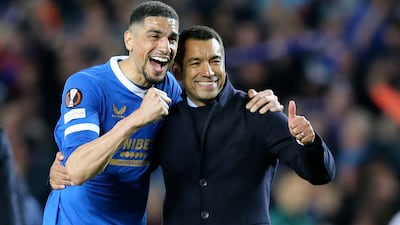 Rangers manager Giovanni van Bronckhorst (R) and his player James Tavernier (L) celebrate after winning the UEFA Europa League semi final, second leg soccer match between Rangers FC and RB Leipzig in Glasgow, Britain, 05 May 2022. EPA / ROBERT PERRY