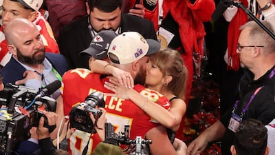 Kansas City Chiefs' Travis Kelce kisses partner Taylor Swift as they celebrate after Kansas City Chiefs win Super Bowl LVIII. Reuters
