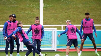 England's Jack Grealish passes the ball during training. PA