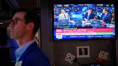 SpaceX IPO news is broadcast on the floor of the New York Stock Exchange. Bloomberg