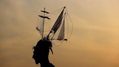 You won't find someone else wearing the same outfit if you put a boat on your head. Getty Images