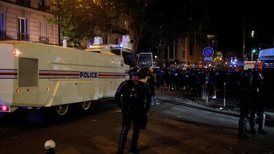 French police block a street. AFP