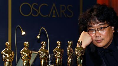Bong Joon-ho poses with the Oscars for "Parasite" at the Governors Ball after the Oscars on Sunday, February 9, 2020, at the Dolby Theatre in Los Angeles. Reuters
