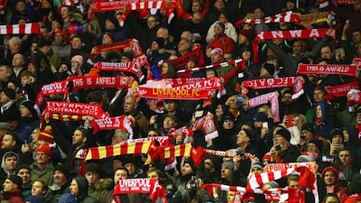 The Anfield stadium is like a box inside, with fans close, and hearing You’ll Never Walk Alone and seeing all the supporters waving their scarves and flags on the Kop is incredible, according to Diego Forlan. Alex Livesey / Getty Images