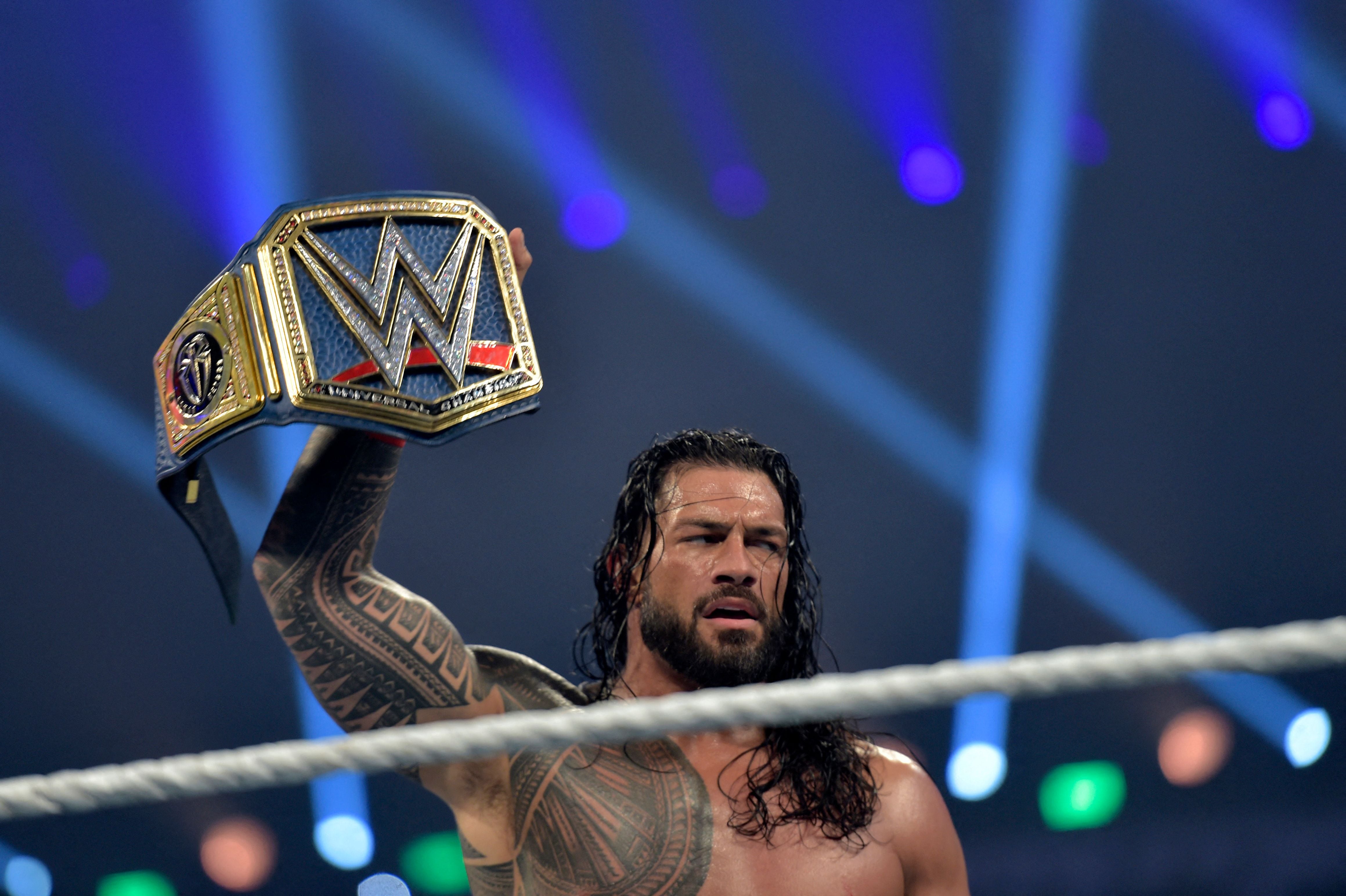 Roman Reigns, pictured, will face Sami Zayn. AFP