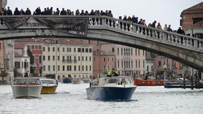 Vaporettos on the Grand Canal during high water in Venice last week. Andrea Merola / EPA