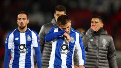 Dejected Porto players leave the field. AP Photo