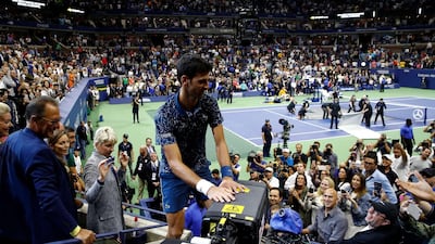 NEW YORK, NY - SEPTEMBER 09: Novak Djokovic of Serbia celebrates with his box after winning his men's Singles finals match against Juan Martin del Potro of Argentina on Day Fourteen of the 2018 US Open at the USTA Billie Jean King National Tennis Center on September 9, 2018 in the Flushing neighborhood of the Queens borough of New York City. Julian Finney/Getty Images/AFP == FOR NEWSPAPERS, INTERNET, TELCOS & TELEVISION USE ONLY ==