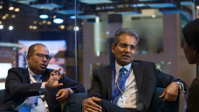 Acwa Power chief investment officer Rajit Nanda and chief executive Paddy Padmanathan at Wetex in Dubai World Trade Centre . Leslie Pableo for The National