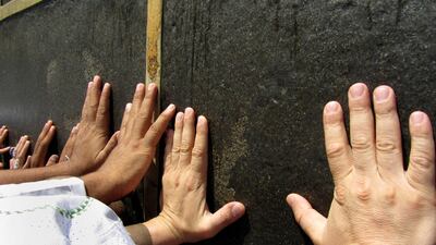 Muslim pilgrims greet the Kaaba, the cubic building at the Grand Mosque, as they gather ahead of the annual Hajj pilgrimage. AP