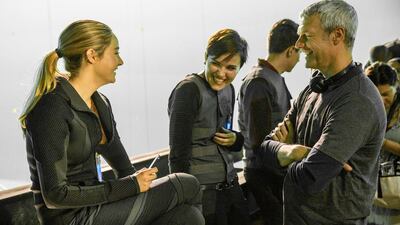 From left to right: the actress Shailene Woodley, the author Veronica Roth and the director Neil Burger on the set of Divergent. Courtesy Jaap Buitendijk / Summit Entertainment