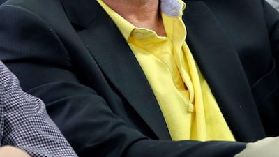 New York Yankees part owner and co-chairman Hank Steinbrenner listens as shortstop Derek Jeter speaks during a news conference, in Tampa, Florida in 2014. AFP