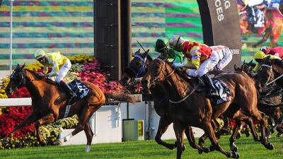 Joao Moreira riding Designs on Rome Defeats Zac Purton Riding Military Attack and Hugh Bowman riding Criterion, left, in Race 8, The Longines Hong Kong Cup during International Race day at Sha Tin racecourse on December 14, 2014 in Hong Kong, Hong Kong. (Photo by Vince Caligiuri/Getty Images)