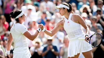 Ons Jabeur of Tunisia reacts after winning the 3rd round match against Garbine Muguruza of Spain.