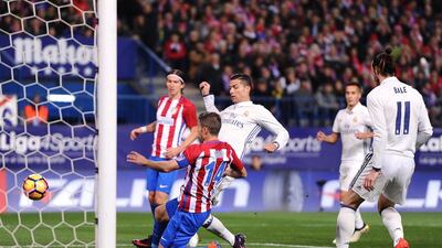 Cristiano Ronaldo of Real Madrid puts the ball in the net only for the goal to be disallowed. Denis Doyle / Getty Images