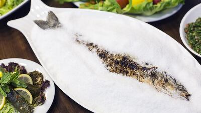 Fish in Sea Salt is Al Jazira Chez Louis restaurant’s signature dish. Courtesy Al Jazira Chez Louis