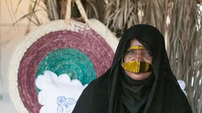 A burqa is made of a cloth called al sheel and then a wooden piece known as al seif is placed in the centre of the fabric, where the nose is. Photo: Abu Dhabi Department of Culture and Tourism