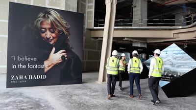Interior work on the residential complex and hotel continues, but the dramatic addition to the Dubai skyline will not be fully unveiled until the end of next summer. Pawan Singh / The National