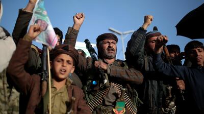 Houthi supporters chant slogans as they attend a demonstration against the United States over its decision to designate the Houthis a foreign terrorist organization in Sanaa, Yemen. AP Photo