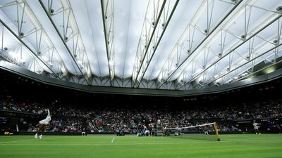 General view of Centre Court with the roof closed as Serena Williams serves against Harmony Tan. Getty Images
