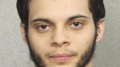 Esteban Santiago, 26, an Iraq war veteran, was in custody in connection with the killing of five people at Fort Lauderdale’s main airport. Broward Sheriff’s Office / AP Photo