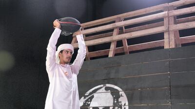 A young man takes a fitness challenge at XDubai's booth in Mohammed Bin Zayed Council for Future Generations sessions.