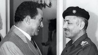 Egyptian president Hosni Mubarak greets Iraqi Prime minister Taha Yassin Ramadan on August 8, 1988, in Alexandria. AFP