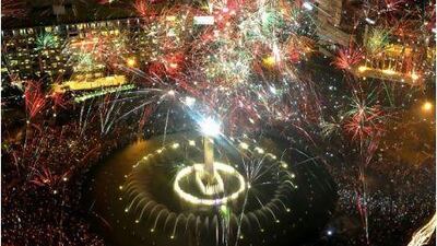 Fireworks are seen above Jakarta's downtown to mark the New Year. Hundreds of thousands of people gathered for the display.