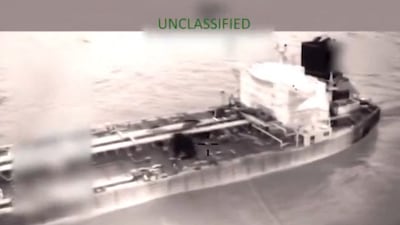 A screengrab from a video shows the US Coast Guard boarding and seizing the tanker Olina in international waters, off Venezuela. Kristi Noem / X