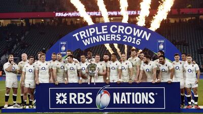 England celebrate with the trophy after winning the Triple Crown. Reuters / Toby Melville