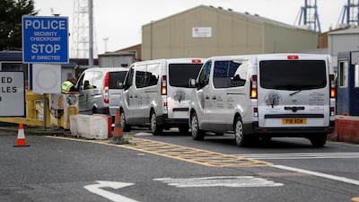 Vehicles belonging to a funeral home arrive at the Port of Tilbury, Essex where the bodies of 39 people are being held by the authorities, following their discovery in a lorry container on Wednesday morning. Reuters