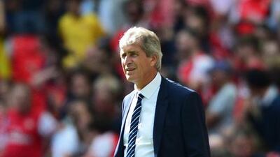 Manchester City manager Manuel Pellegrini, pictured during the Community Shield match against Arsenal at Wembley Stadium in London on August 10, 2014, says he does not expect another slow start to the season from his team. Carl Court / AFP