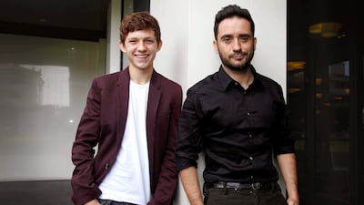 Tom Holland, left, in jeans, a white T-shirt and burgundy blazer, and Juan Antonio Bayona attend the 'The Impossible' presentation during the at 45th Sitges International Fantastic Film Festival of Catalonia, in Sitges, Spain on October 7, 2012. EPA