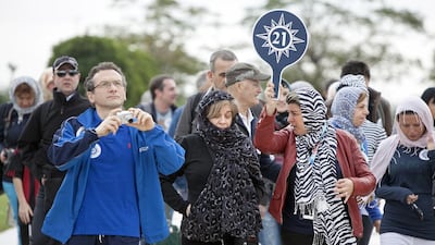 Estimates put the direct contribution of travel and tourism to the Emirates' GDP at Dh56.5 billion last year, representing 4 per cent of total GDP. Above, tourists at the Sheikh Zayed Grand Mosque in Abu Dhabi. Silvia Razgova / The National