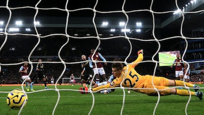 Manchester City's Sergio Aguero scores his side's fifth goal during their 6-1 win at Aston Villa in the Premier League on Sunday, January 12. PA