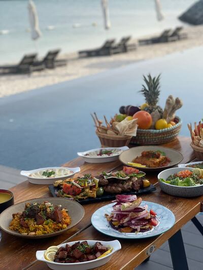 The lamb ouzi and mixed grill are highlights of this iftar menu. Photo: Cove Beach Abu Dhabi