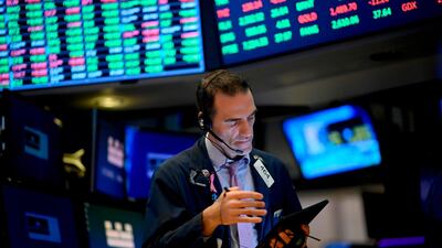 Traders at the New York Stock Exchange. Analysts say a challenging regulatory environment as one reason to diversify out of US tech shares. AFP