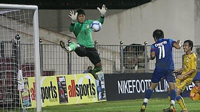 India force a leaping save by Thailand’s goalkeeper during a sparsely attended international friendly in New Delhi last month.