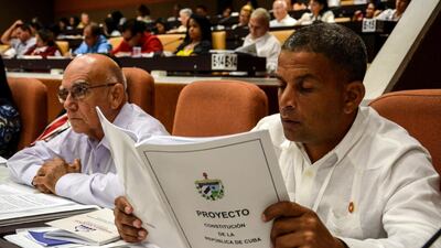 Cuban lawmakers approved Castro-heavy cabinet named by new President Miguel Diaz-Canel / AP
