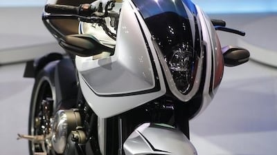 Suzuki Motor Corp’s motorcycle Recursion is seen at the 43rd Tokyo Motor Show November 20, 2013. which kicked off on Wednesday for the media. REUTERS/Yuya Shino