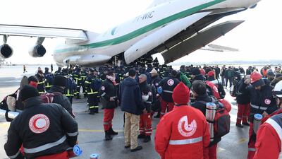 Algerian rescue teams arrive at Aleppo International Airport. AFP