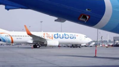 A flydubai plane on the tarmac at Terminal 2 of the Dubai International airport in Dubai.