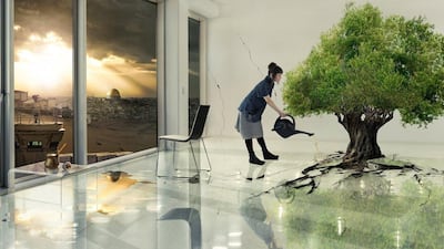 Larissa Sansour's 'Olive Tree' (2012), a photograph inspired by her film 'Nation Estate', which depicts the state of Palestine housed in a single building. Courtesy of the artist and Lawrie Shabibi