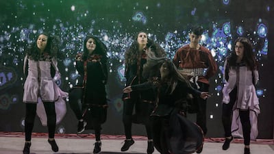 Palestinian youth perform the Dabka dance, usually performed at joyous occasions, at the tree lighting ceremony. EPA